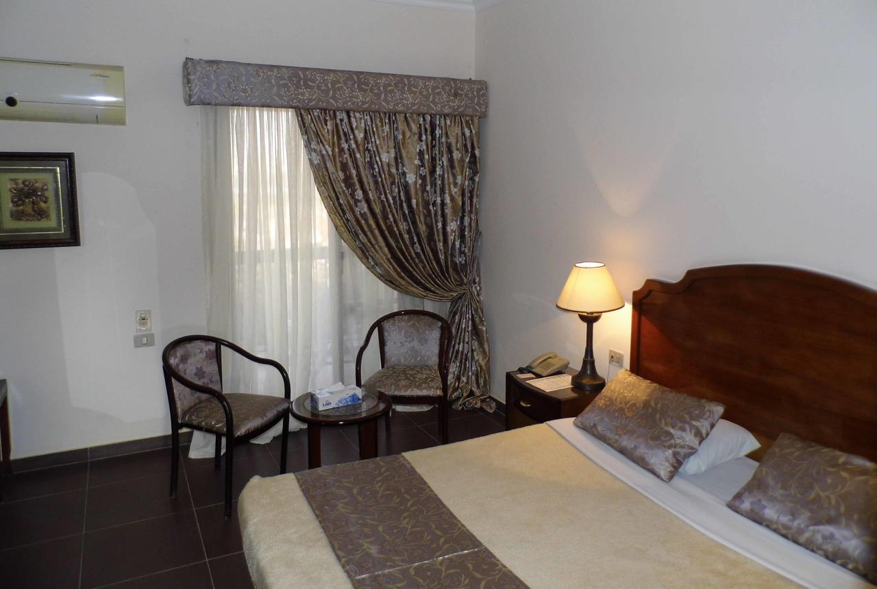 Mg Nefertiti Hotel Ελ Μίνια Δωμάτιο φωτογραφία